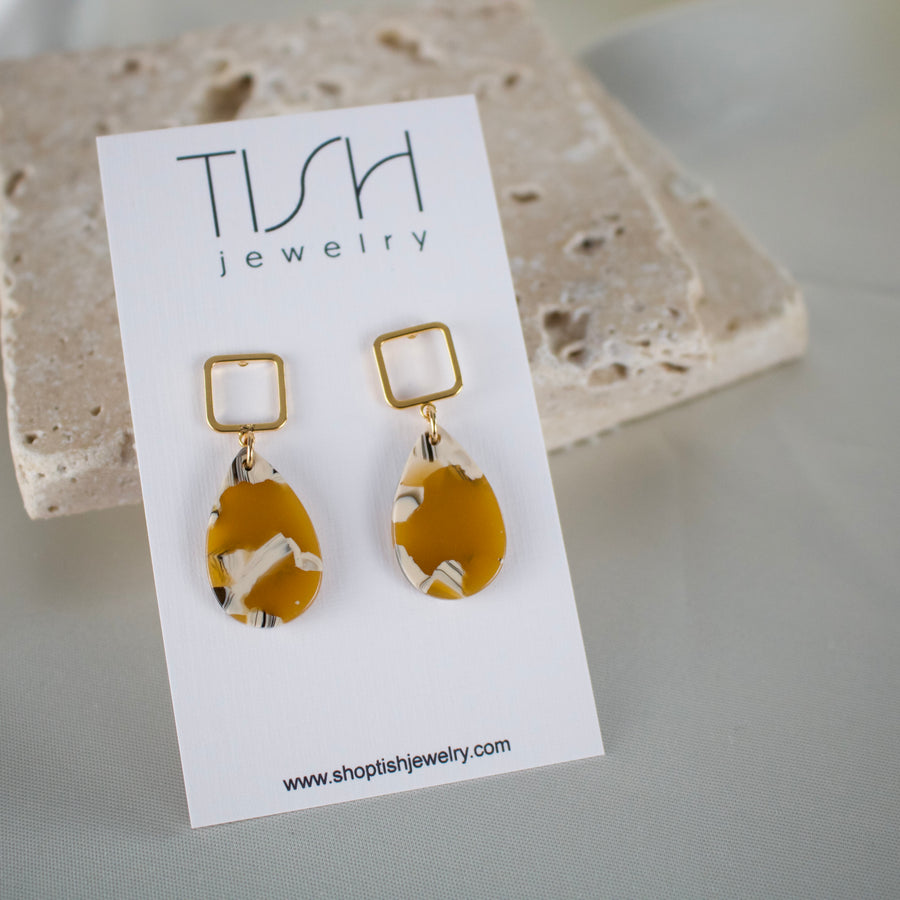 E44 - Golden teardrop acetate charm earrings